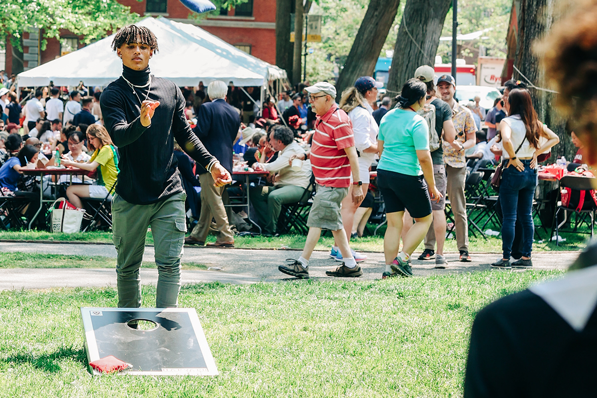 Alum playing lawn games at Harvard Alumni Day