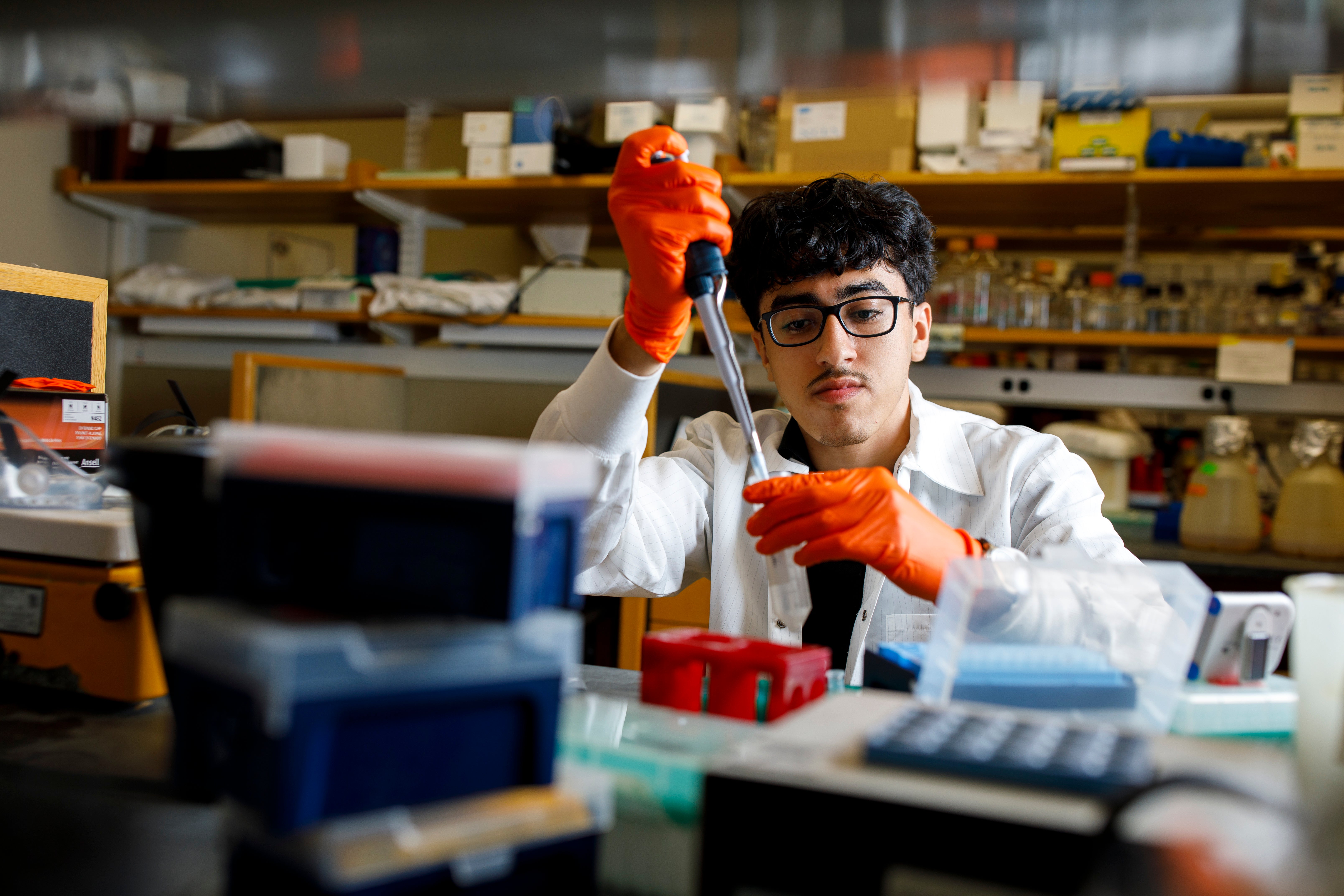 Undergraduate student working in a lab.