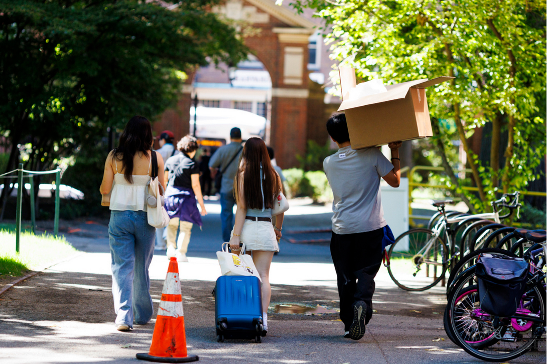 Incoming students walking on campus.