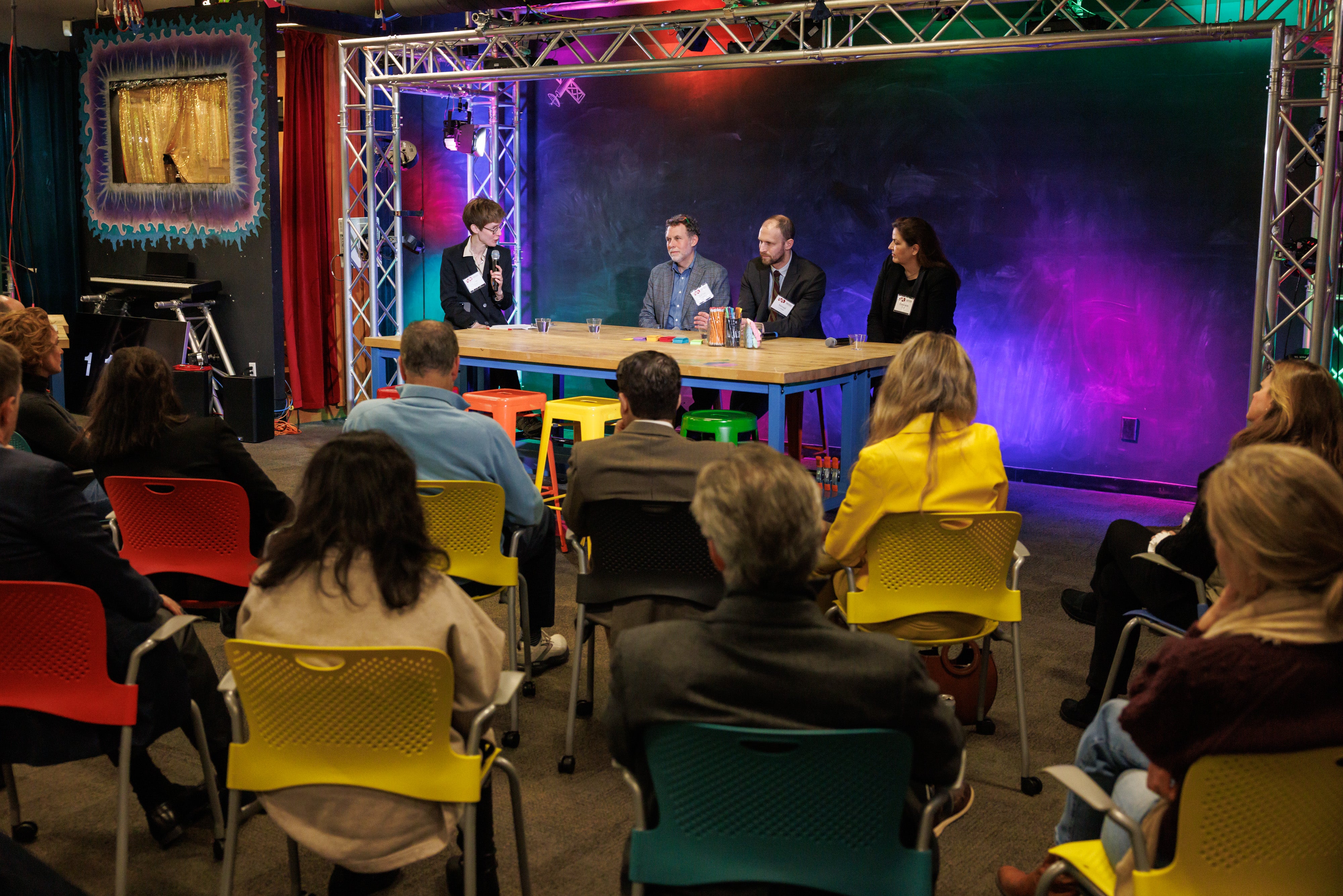 Members of the Committee on University Resources listening to experts speak at annual symposium.