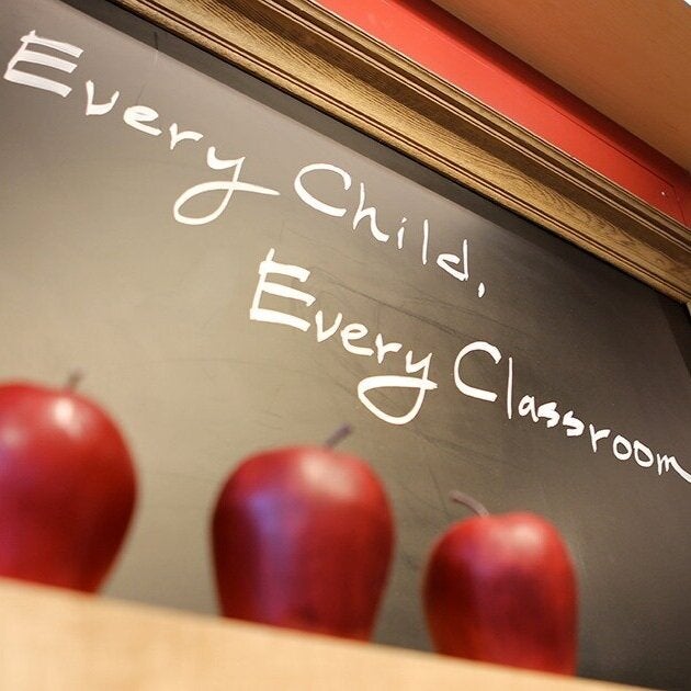 "Every Child, Every Classroom" written on chalkboard