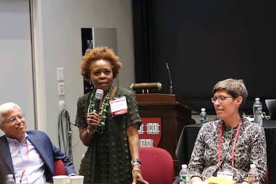 Nozipo Maraire AB ’87 speaks at a Harvard alumni event