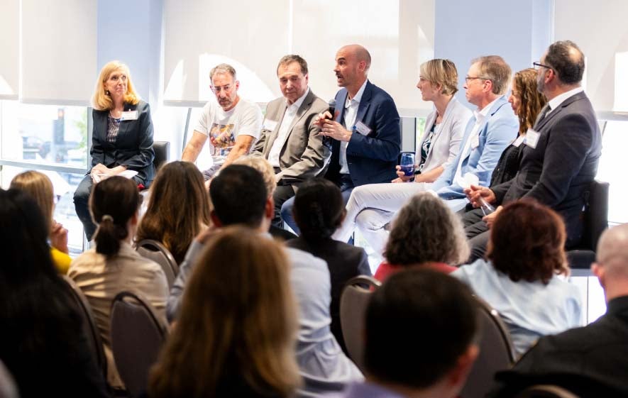A group of health and safety experts participating in a panel discussion on the Los Angeles wildfires. Details to follow in caption.