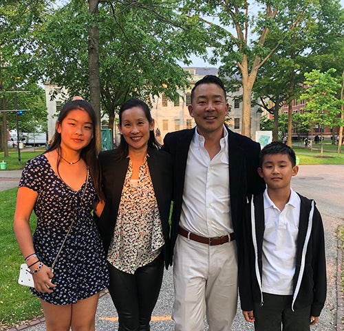 Mike Choe '94 and his family in the Yard