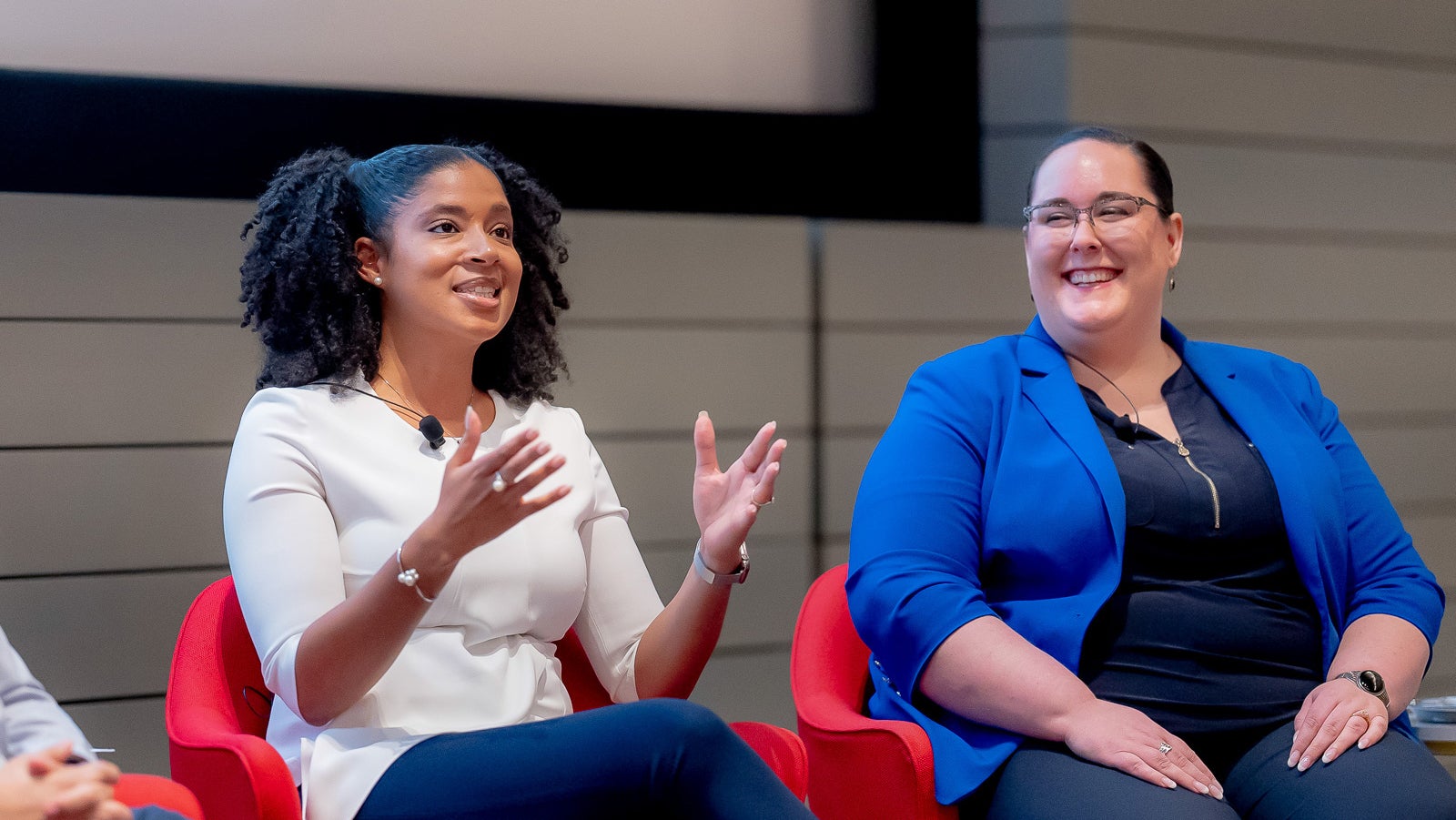 Erica Scott-Puopolo AB ’06 looks at Layla Ramirez MBA ’17 as Layla speaks during the first-generation Harvard alumni panel