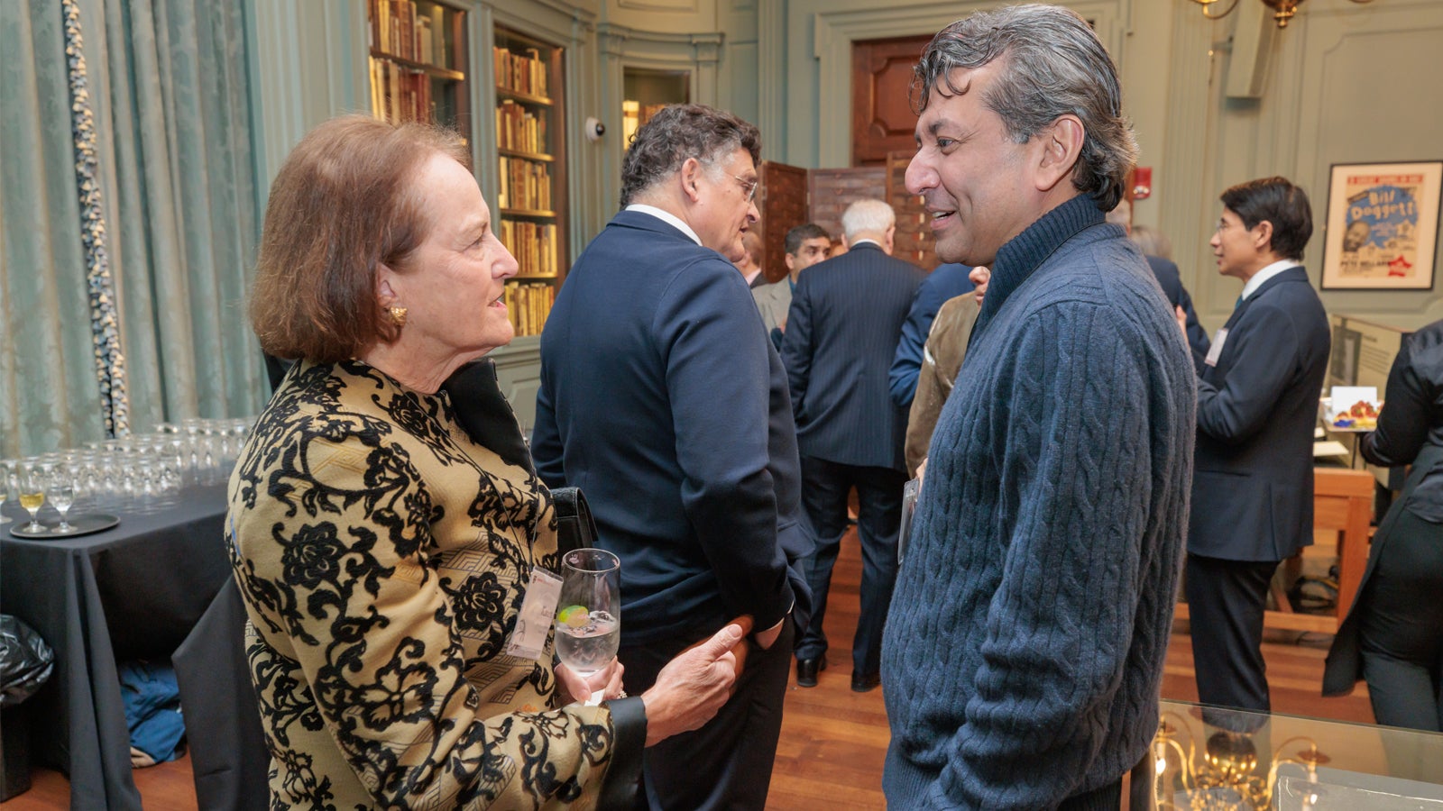 Karen Gordon Mills AB ’75, MBA ’77 and Siddhartha Yog MBA ’04 in conversation during a welcome reception at the 2024 Global Advisory Council meeting.