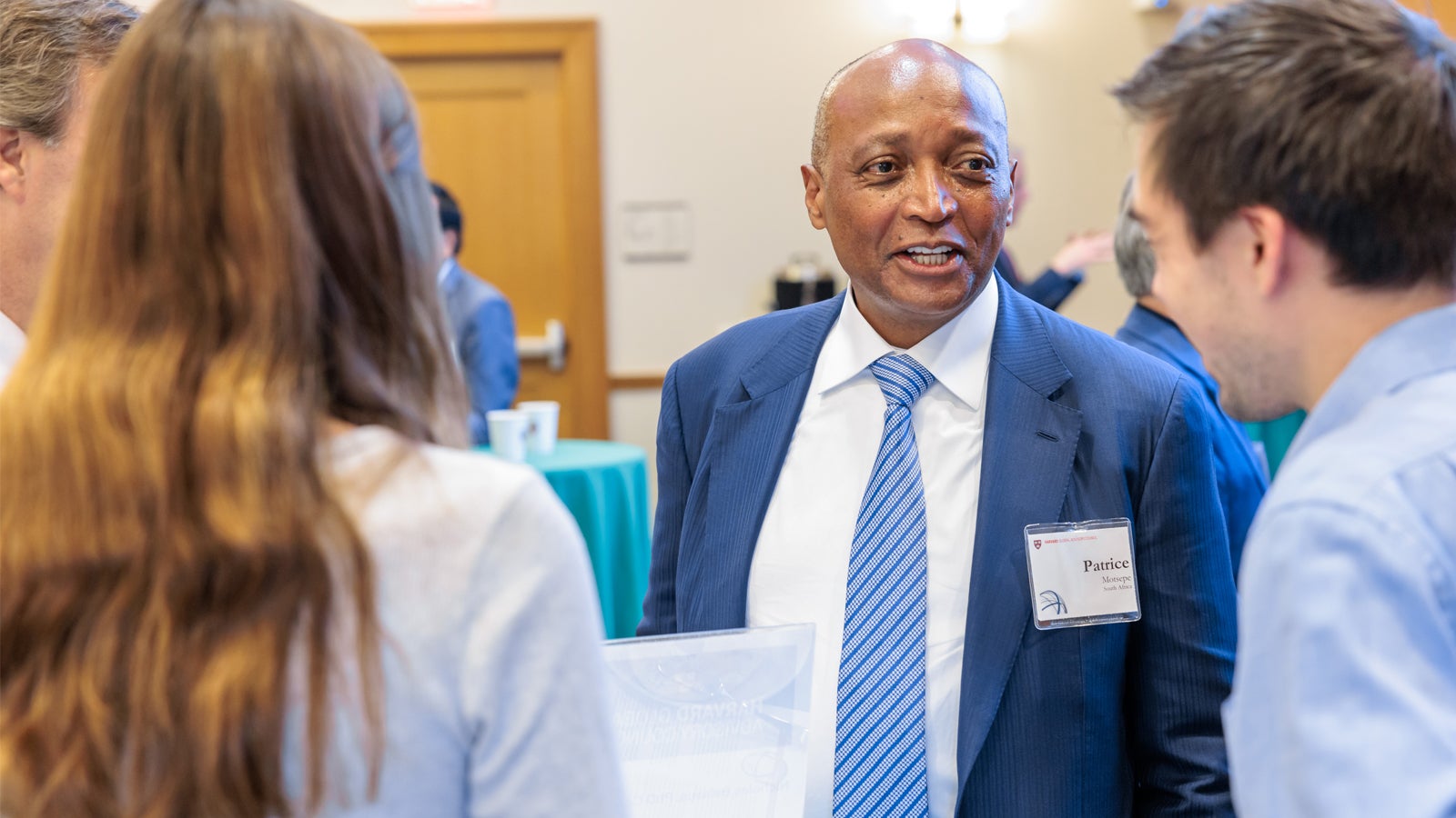 Patrice Motsepe engaging with Harvard students at the 2024 Global Advisory Council meeting.