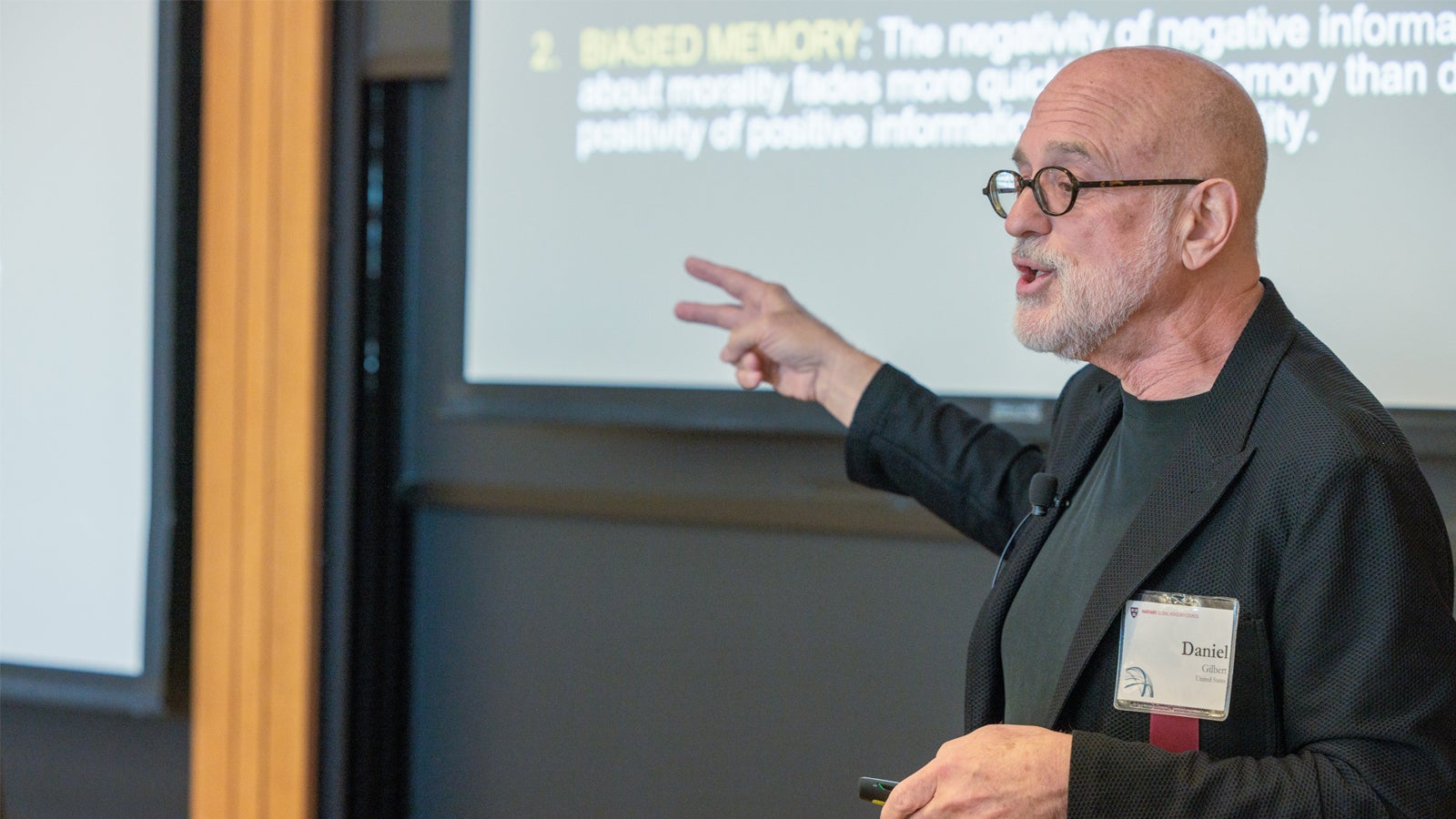 Harvard faculty member Daniel Gilbert presenting a TED-style talk at the 2024 Global Advisory Council meeting.