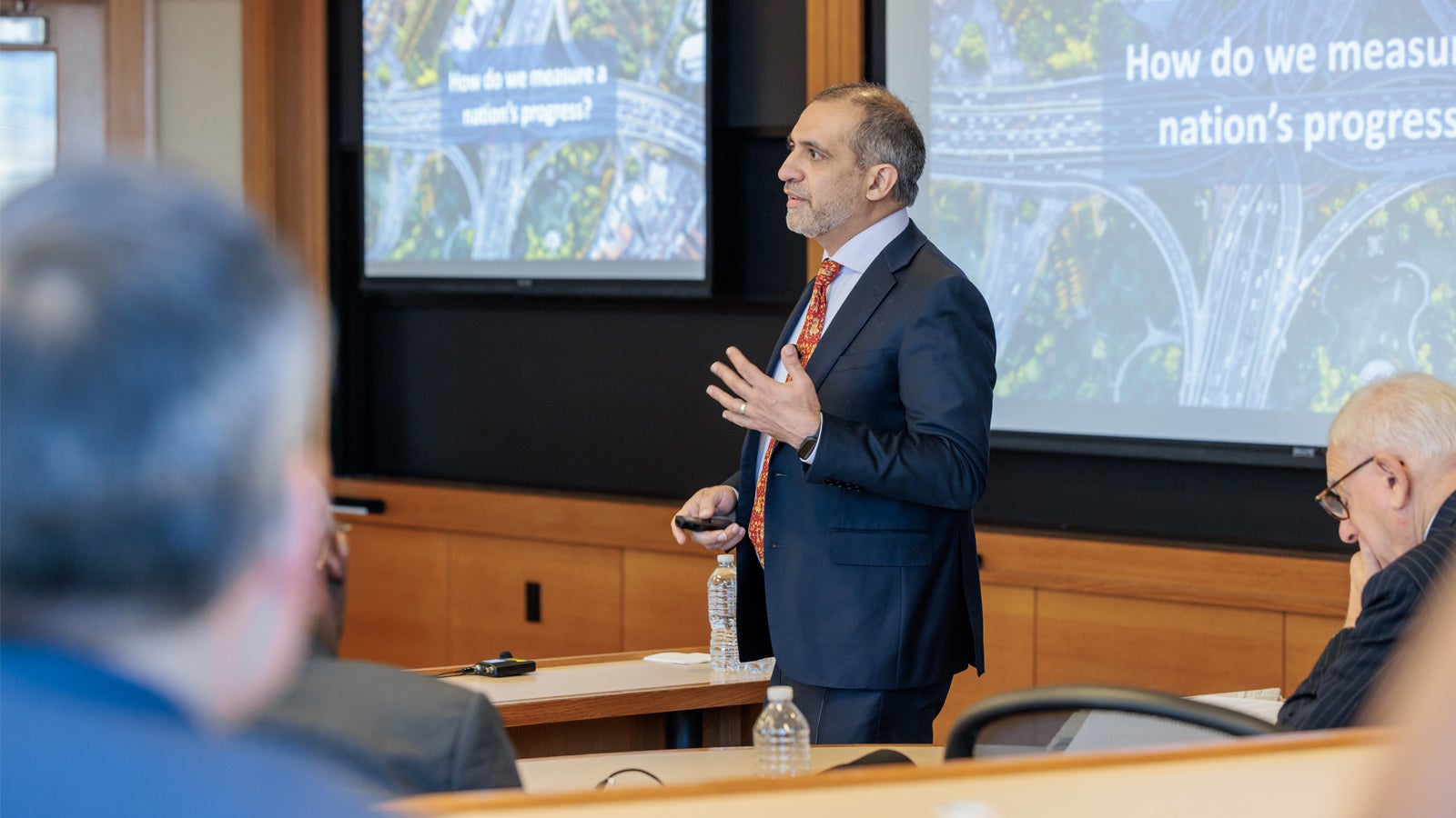 Harvard faculty member Asim I. Khwaja PhD ’01 presenting a TED-style talk at the 2024 Global Advisory Council meeting.