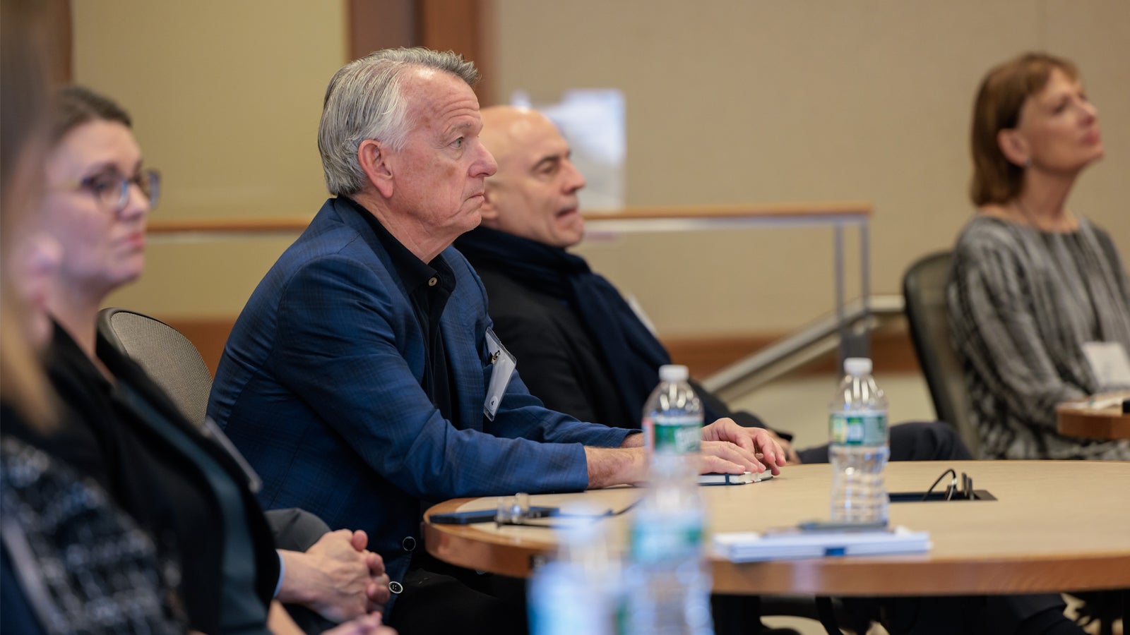 Paul B. Edgerley MBA ’83 and Scott Mead AB ’77 enjoying the TED-style faculty talks at the 2024 Global Advisory Council meeting.