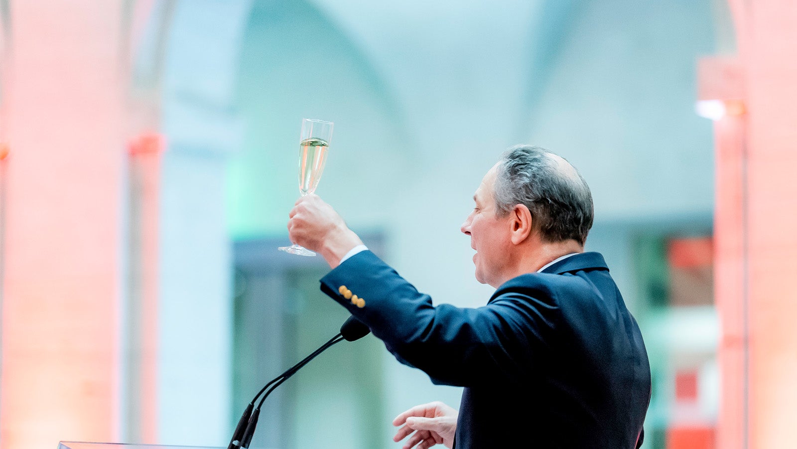 Carl Martignetti AB '81, MBA '85 raises a toast to President Bacow JD '76, MPP '76, PhD '78 during the COUR reception at the Harvard Art Museums