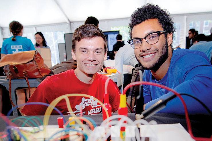 Students pose with their project