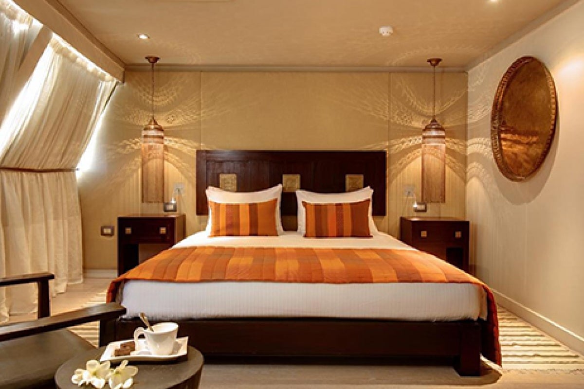 Nile Adventurer Presidential Suite with a king bed