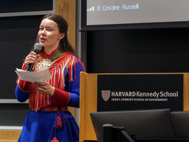 Inga Julie Sara speaks at the front of a lecture hall at Harvard Kennedy SChool