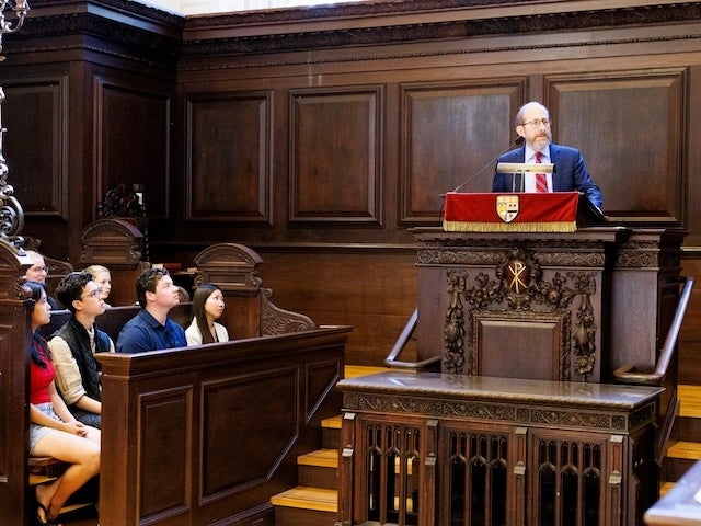 President Alan Garber on the dais at Morning Prayers