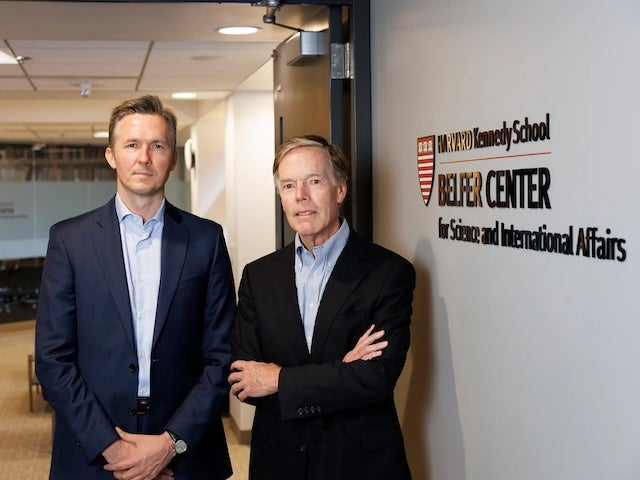 Julian Simcock and Nicholas Burns inside the Belfer Center at Harvard Kennedy School