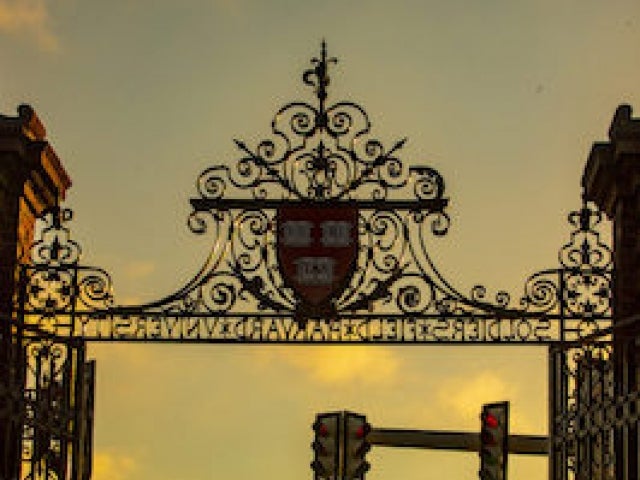 A gate at Harvard University on Soldiers Field Road, which runs beside the athletic complex