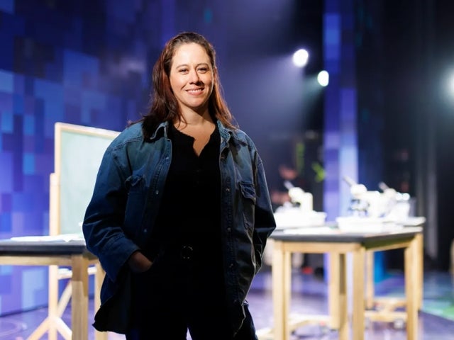 Director of “Wonder” Taibi Magar smiles in front of stage