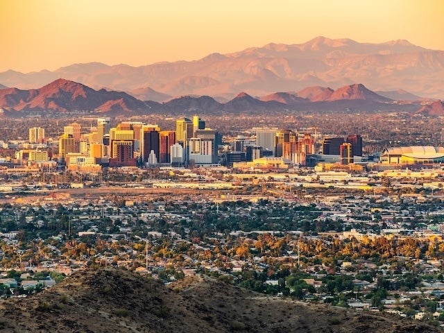 Skyline of Phoenix, Arizona with mountains in the background