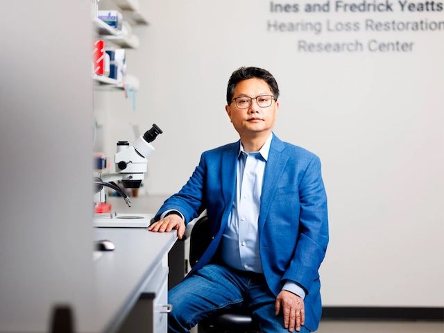 Zheng-Yi Chen in his lab