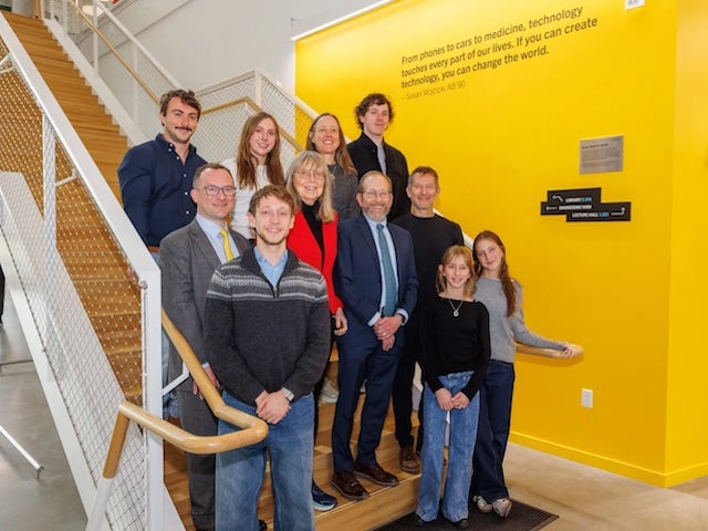 President Alan Garber and Dean David Parkes with members of the Troper Wojcicki family