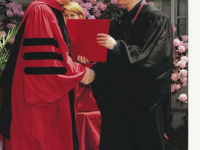 Bing Han receiving a Harvard degree