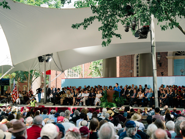 Crowd at Harvard Alumni Day listening to Jonny Kim deliver the keynote address