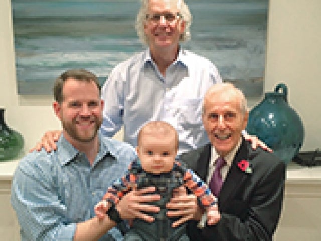 Robert James MBA ’48, PhD ’53 and Ralph James MBA ’82 with members of their family.