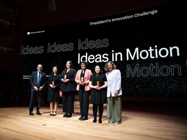 President Alan Garber on stage with President's Innovation Challenge winners