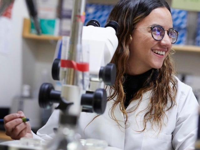 Maria Perez-Matos in a lab