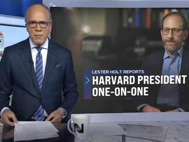 NBC News anchor Lester Holt stands at a news desk in a studio, holding papers. Behind him is a split screen showing an image of the Harvard University campus and a video still President Alan Garber. Text on the screen reads "Lester Holt Reports: Harvard President One-on-One." The NBC Nightly News logo is visible in the bottom right corner.