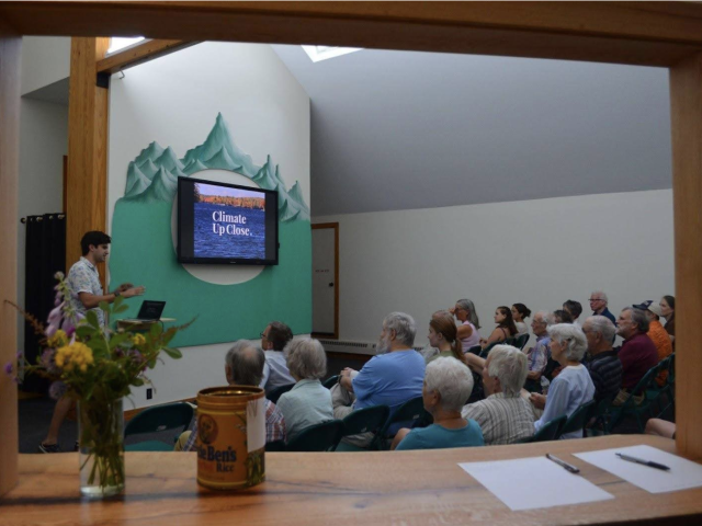 Climate Up Close co-founder Nathaniel Tarshish presents to a New Hampshire community