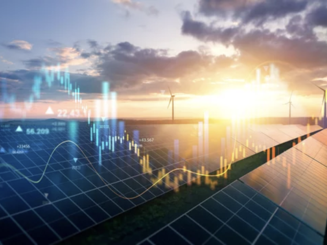 A stock market ticker display superimposed over solar panels and wind turbines