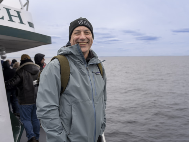 Rob Verchick stands on a whale-watching boat in the Stellwagen Bank Marine Sanctuary off the coast of Massachusetts 