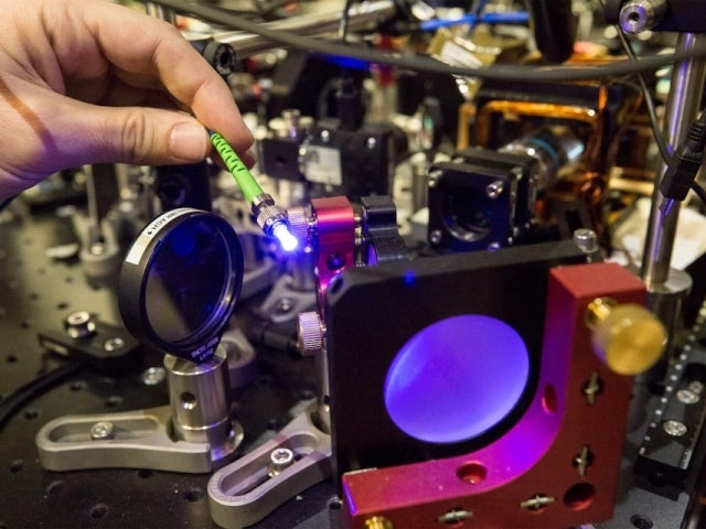 Harvard researchers work with a quantum simulator.