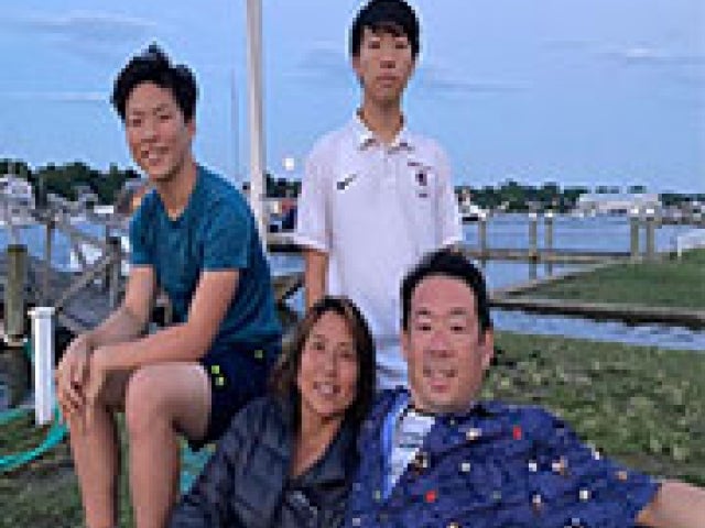 Peter Kyunghwan Kim ’91 and his wife, Sarah, and their two boys
