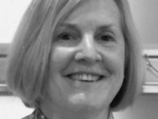 headshot of merilee grindle