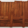 An art exhibit made from wood planks attached horizontally and vertically together.