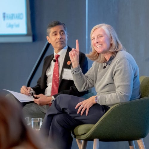 Hopi Hoekstra on stage with Harvard College Fund co-chair Ravin Agrawal