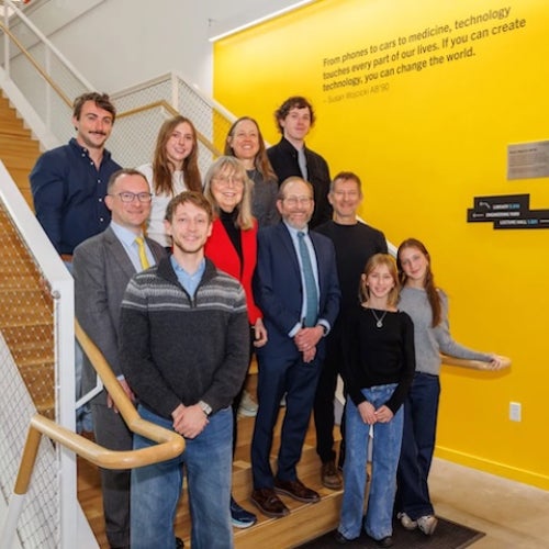 President Alan Garber and Dean David Parkes with members of the Troper Wojcicki family