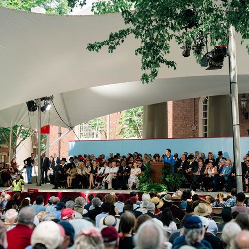 Crowd at Harvard Alumni Day listening to Jonny Kim deliver the keynote address