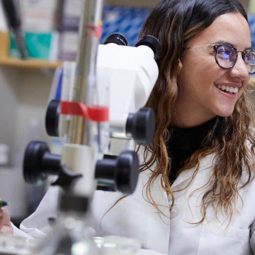 Maria Perez-Matos in a lab