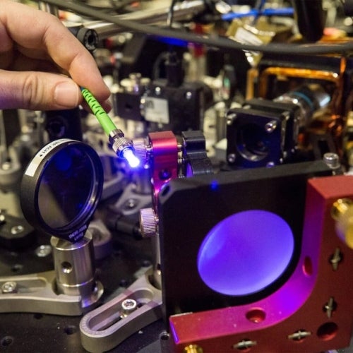Harvard researchers work with a quantum simulator.