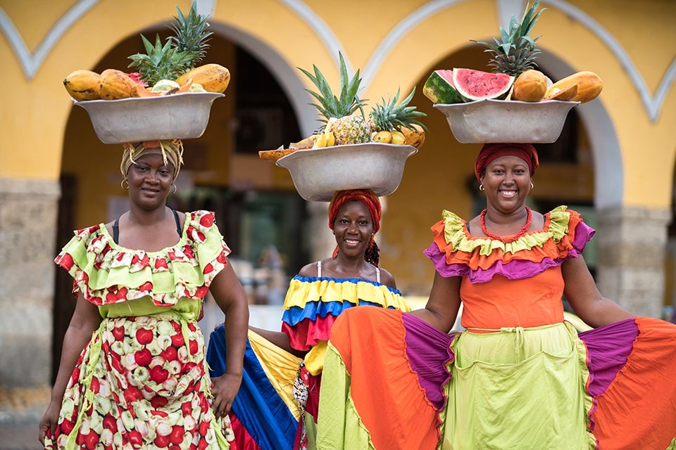 Colombia Women carrying Fruit