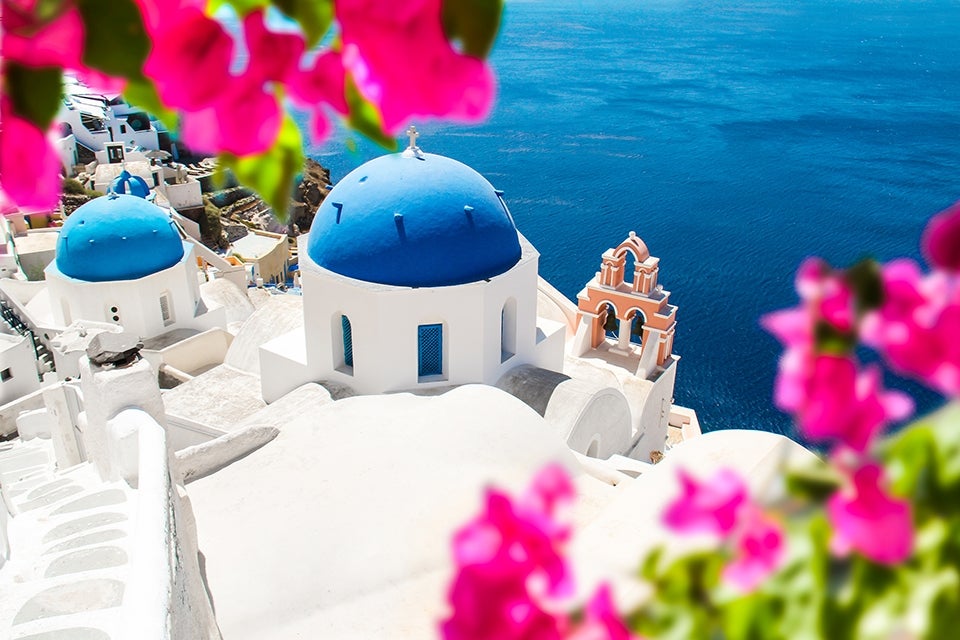 White buildings with blue roofs in Mykonos, Greece