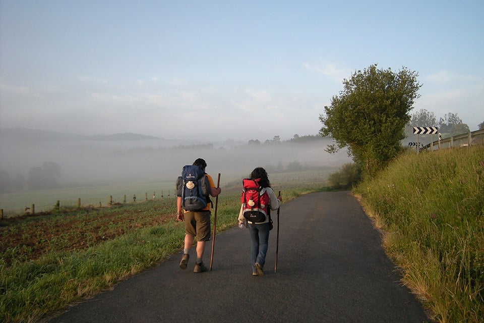 hikers on road